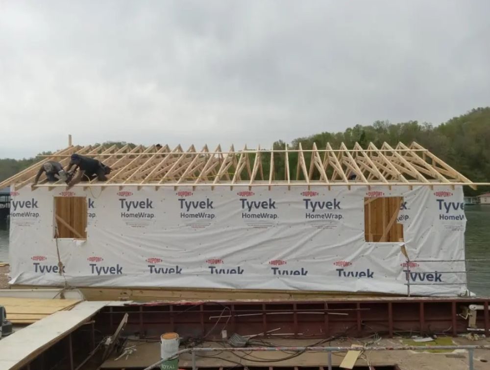 General contractor Knoxville TN: framed building wrapped in house wrap