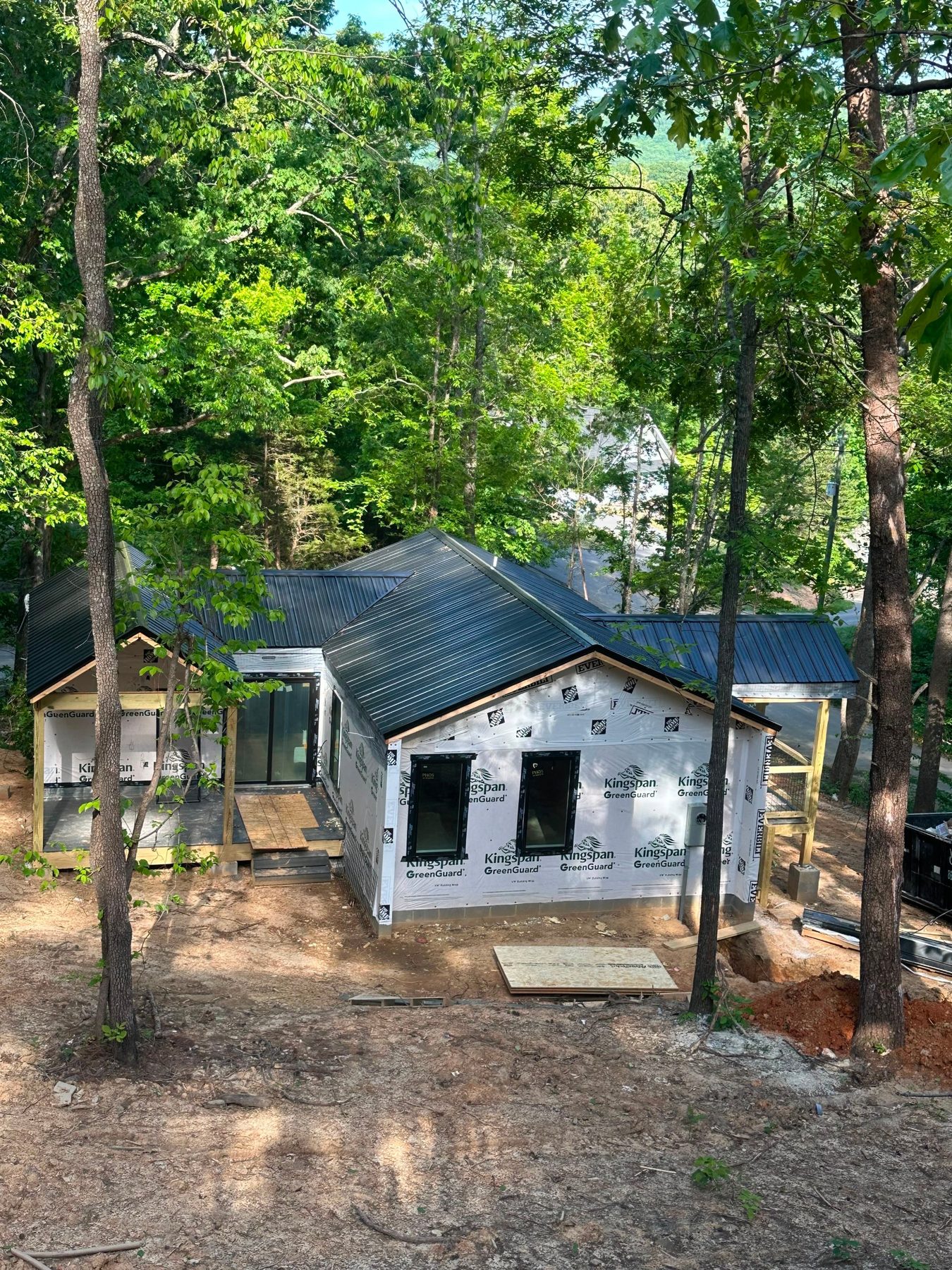 New metal roof installed on a building under construction