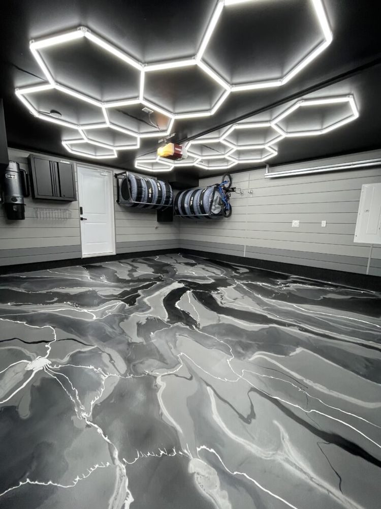 Industrial construction Knoxville TN: shop interior with a metallic epoxy floor